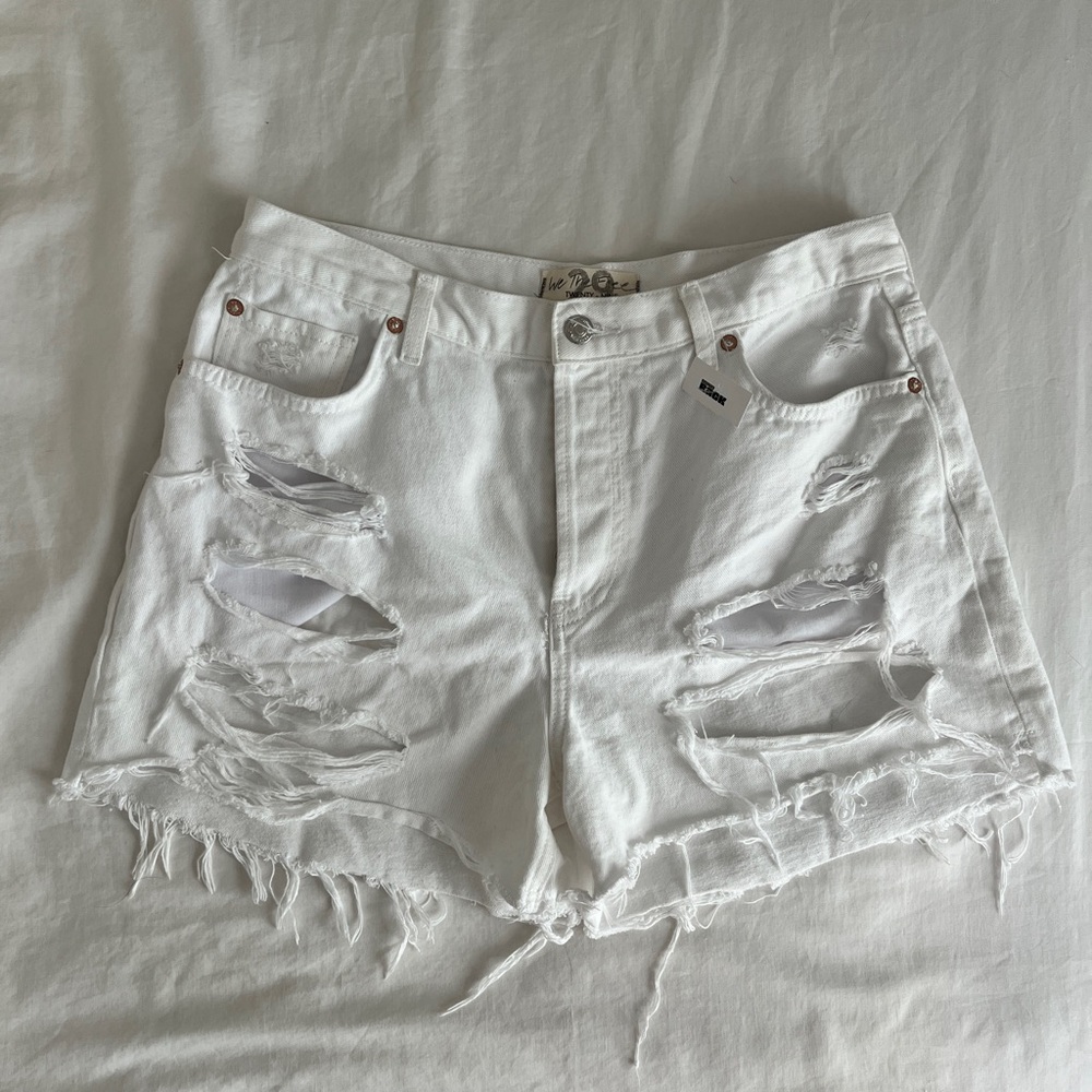 Free People White Jean Shorts with Distressed Design